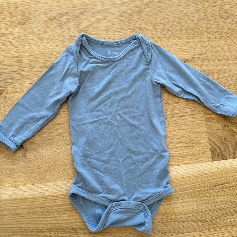 Kyte bodysuit. Storm blue. Size 3-6 months. Used like new. No signs of use.